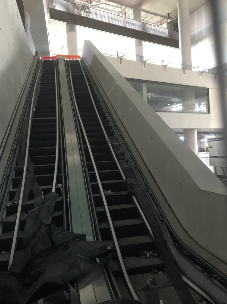 Escalators as yet still being fitted lead from second to fourth floor