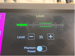 Screen on the Rodecaster Pro showing level meter and a 'phantom power' switch set to 'off'