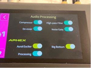 A touch screen showing various audio processing ooptions: compressor, de-esser, high pass filter, noise gate, aural exciter, big bottom and processing
